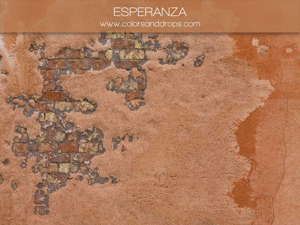 Fondo y suelo fotográficos Esperenza – pared enlucida naranja con piedras a la vista | Colors&Drops