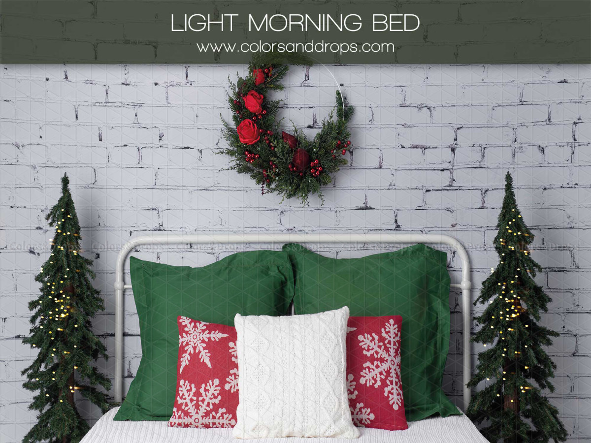 Christmas photo backdrop Light Morning Bed – white bed with green and red cushions and wreath | Colors&Drops