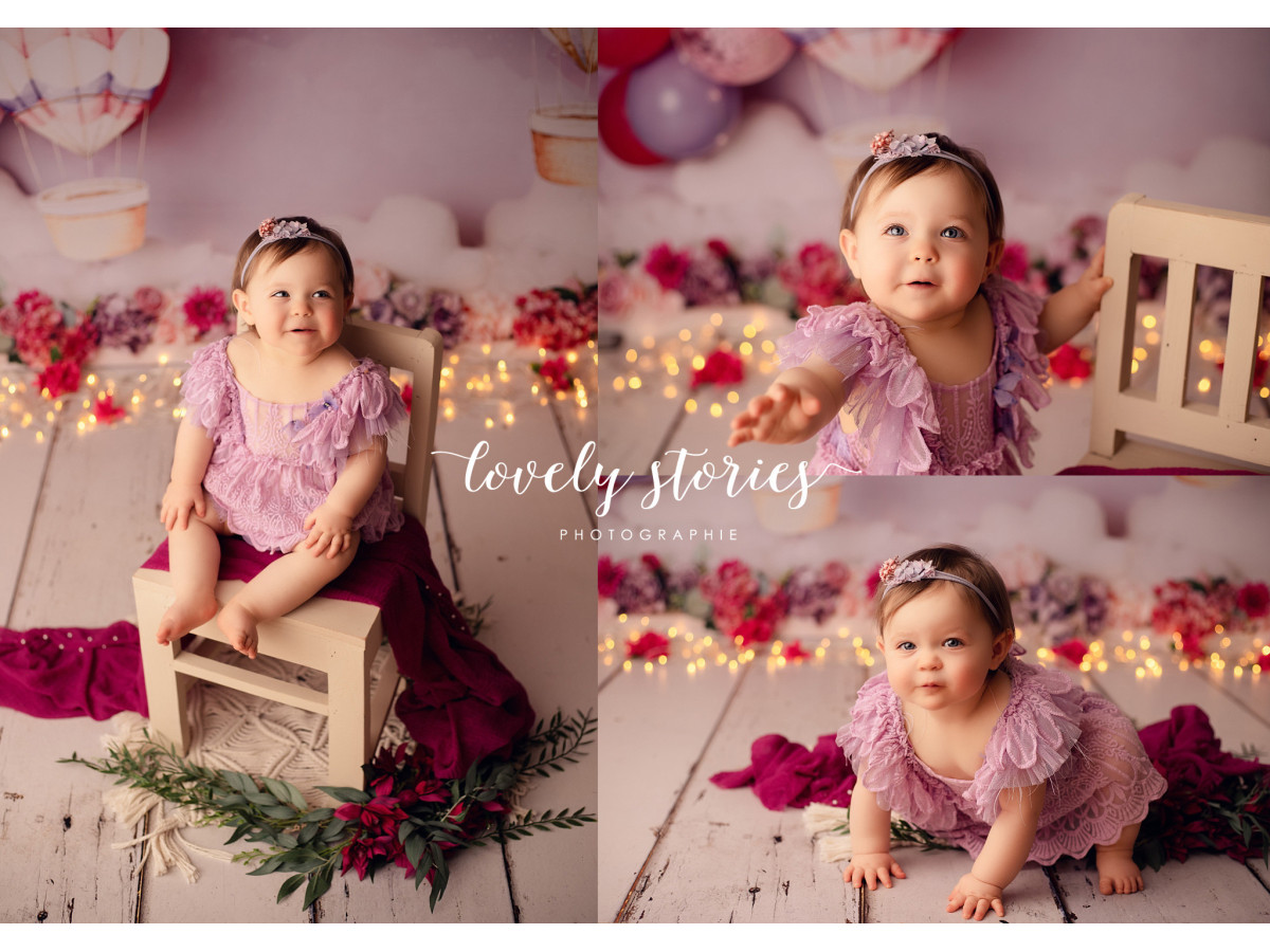 Baby & cake smash photo backdrop Magnifica – red and purple balloon arch with hot air balloons and flowers | Colors&Drops