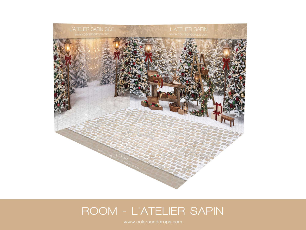 Fond photo d'angle de Noël L'Atelier Sapin – atelier sapin enneigé en coin avec sol pavé | Colors&Drops